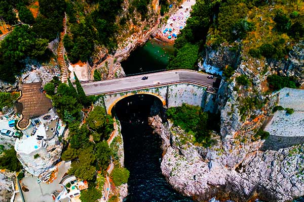 Fiordo di Furore beach surrounded by dramatic cliffs on the Amalfi Coast