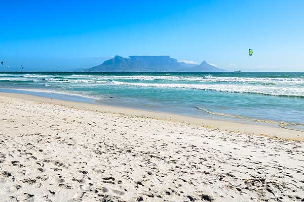 Bloubergstrand beach north of Cape Town with iconic view of Table Mountain across the water