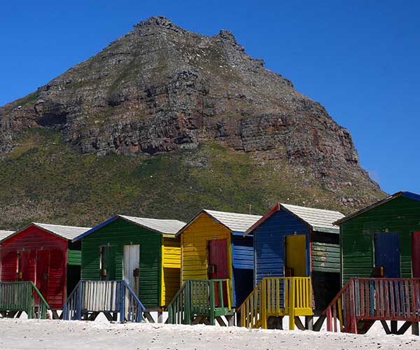 Colourful bathing huts along Muizenberg Beach in Cape Town