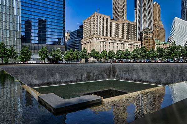 9/11 Memorial Museum exterior and reflecting pools at the World Trade Center site