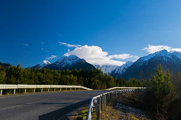 Remote Patagonian road through mountains and wilderness