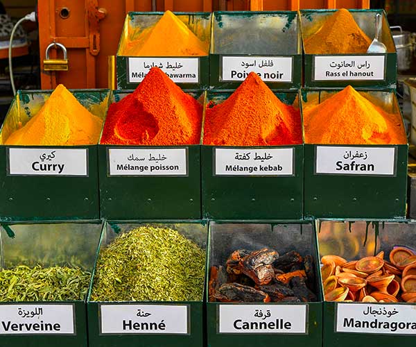 Colourful Moroccan spices displayed in a Marrakech market