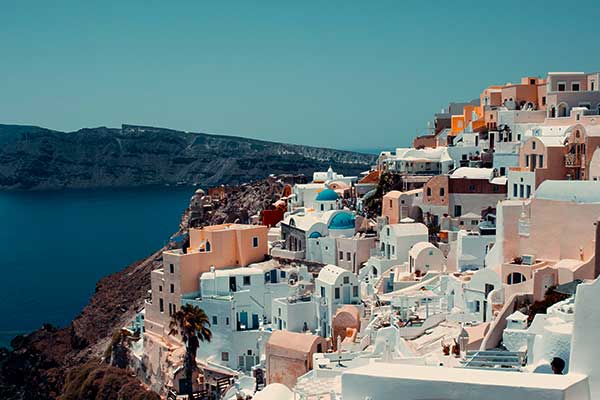 Santorini caldera and whitewashed villages at sunset